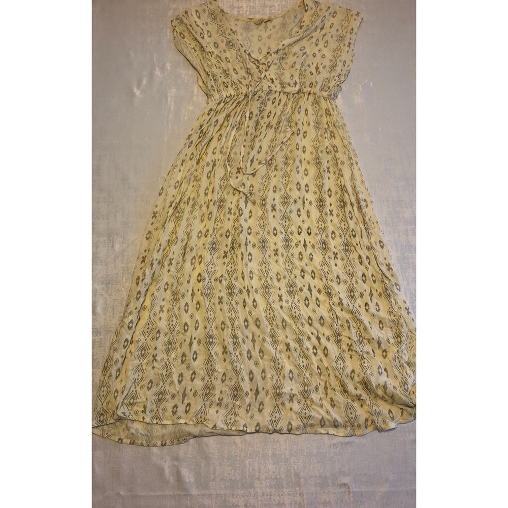 Cream colored maxi dress with little Aztec design!